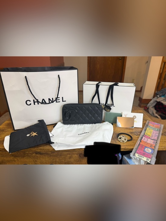 CHANEL Handbags - PRICE FIRM! Chanel Black Quilted Zip Wallet w/COA & intact holo and free gifts